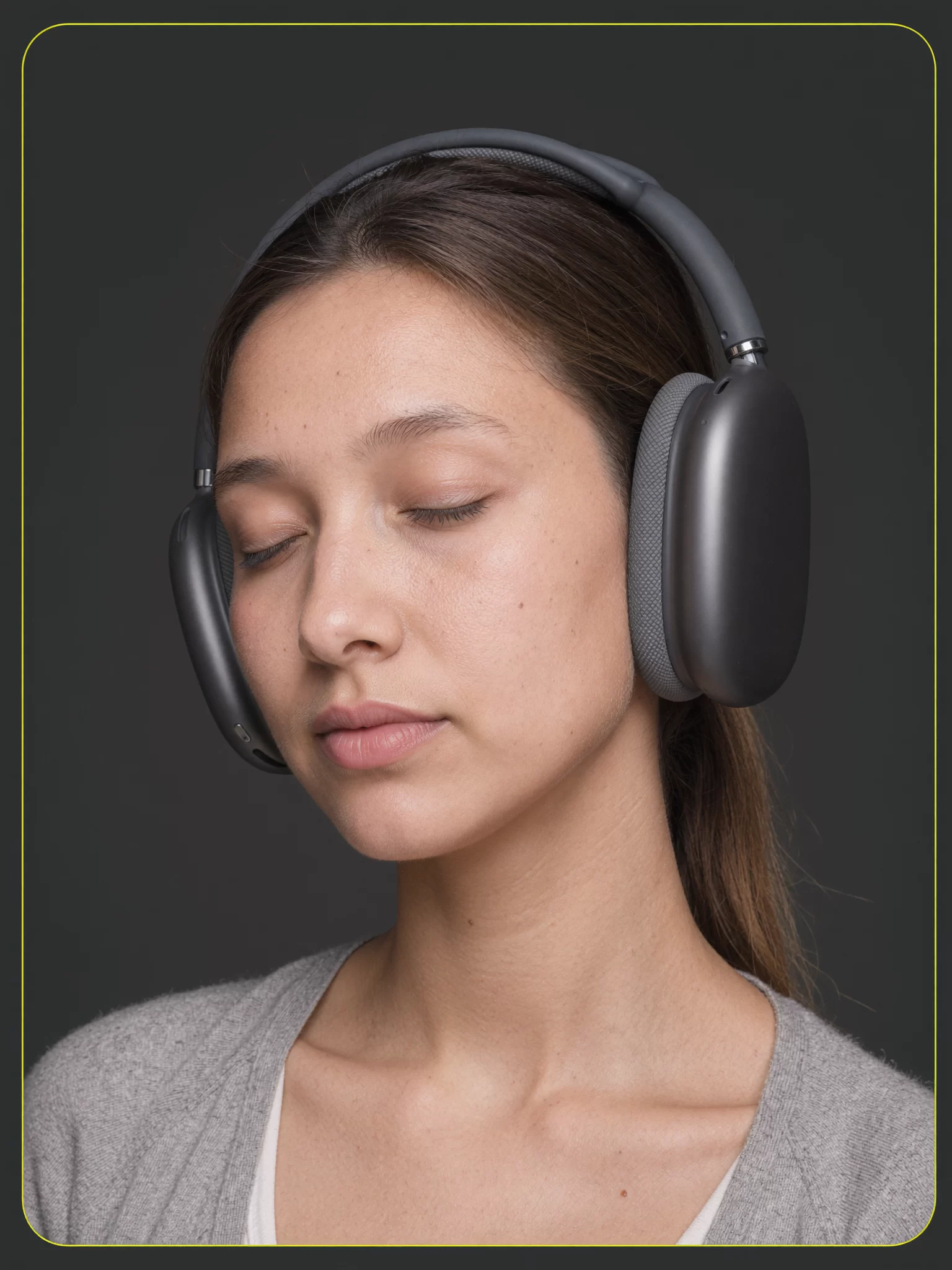 AI character Dhwaja wearing graphite over-ear headphones, eyes closed, against a dark backdrop with a lime rim light. Sample image created by Quiamo, a brand, marketing and media agency from India.